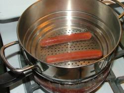 steaming hot dogs