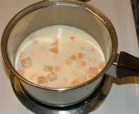 picture of cheese & milk in pot
