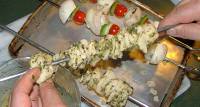 picture of skewering chicken